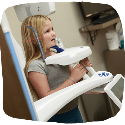 mother and daughter smiling with braces